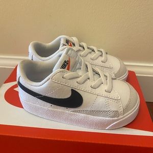 White and black Nike blazer